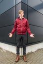 Teenager boy gesticulating doubt and question over urban background Royalty Free Stock Photo