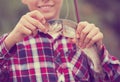 Teenager boy looking at fish on hook Royalty Free Stock Photo