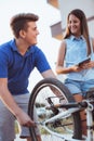 Teenager boy repair tire on bicycle Royalty Free Stock Photo