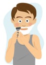 Teenager boy shaving for the first time getting ready for school in the morning. Royalty Free Stock Photo