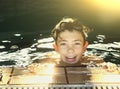 Teenager boys in open air swimming pool Royalty Free Stock Photo