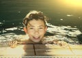 Teenager boys in open air swimming pool Royalty Free Stock Photo