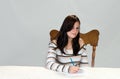 Teenager completing form