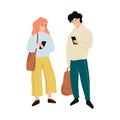 Teenager couple standing and chatting in the mobile phone