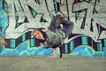 Teenager dancing break dance on the street