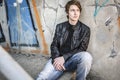 Teenager depressed inside a dirty tunnel Royalty Free Stock Photo