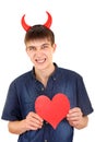 Teenager with Devil Horns and Heart Royalty Free Stock Photo