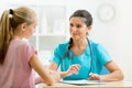 Teenager at doctor office visiting Royalty Free Stock Photo