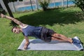 Teenager doing push-up exercises to strengthen muscles