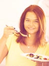 Teenager eating salad Royalty Free Stock Photo