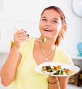 Teenager eating salad Royalty Free Stock Photo