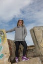 Teenager female posing under blue sky, dance style Royalty Free Stock Photo