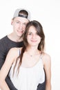 Teenager girl with boyfriend hug in white