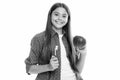 Teenager girl brushing her teeth over isolated yellow background. Daily hygiene teen child hold toothbrush, morning Royalty Free Stock Photo