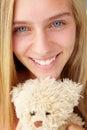 Teenager girl close up with teddy bear Royalty Free Stock Photo