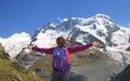 Teenager girl enjoying the panorama of Gorner Glacier and Monte Rosa