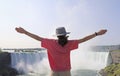 Teenager girl enjoying the panoramic view of Niagara Falls in summer Royalty Free Stock Photo