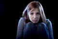 Teenager girl feeling lonely scared sad and desperate suffering depression bullying victim Royalty Free Stock Photo