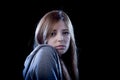 Teenager girl feeling lonely scared sad and desperate suffering depression bullying victim Royalty Free Stock Photo