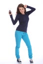 Teenager girl has fun dancing to music MP3 player Royalty Free Stock Photo