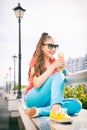 Teenager girl having fun and eating ice cream