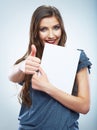 Teenager girl hold white blank paper. Young smilin