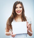 Teenager girl hold white blank paper. Young smilin