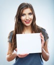 Teenager girl hold white blank paper. Young smilin