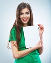 Teenager girl hold white blank paper. Young smilin