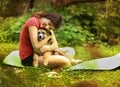 Teenager girl hug puppy shepherd dog close up photo