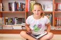 Young girl reading a book. Royalty Free Stock Photo