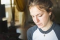 A teenager pensive, looking down. Royalty Free Stock Photo