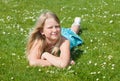 Teenager girl lying on grass Royalty Free Stock Photo