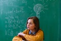 Teenager girl in math class overwhelmed by the math formula. Pressure, Education, Success concept. Royalty Free Stock Photo