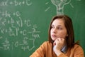 Teenager girl in math class overwhelmed by the math formula. Pressure, Education concept. Royalty Free Stock Photo