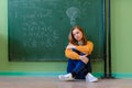 Teenager girl in math class overwhelmed by the math formula. Pressure, Education, Success concept. Royalty Free Stock Photo