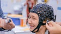 Teenager girl with medical eeg headset Royalty Free Stock Photo