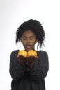 Teenager girl playing with oranges Royalty Free Stock Photo