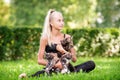 Teenager girl playing with small kittens at warm and sunny summer day Royalty Free Stock Photo