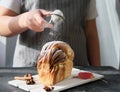artisan sourdough cinnamon swirl bread on wooden rack Royalty Free Stock Photo