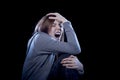 Teenager girl with red hair feeling lonely screaming desperate as bullying victim in depression Royalty Free Stock Photo