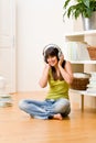 Teenager girl relax home - happy listen to music Royalty Free Stock Photo