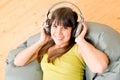 Teenager girl relax home - happy listen to music Royalty Free Stock Photo