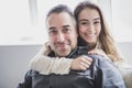 Teenager girl sitting on window with father Royalty Free Stock Photo