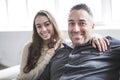 Teenager girl sitting on window with father Royalty Free Stock Photo