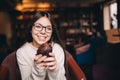 Teenager girl smiling and holding a cupcake Royalty Free Stock Photo