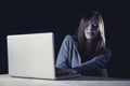 Teenager girl suffering cyberbullying scared and depressed exposed to cyber bullying and internet harassment Royalty Free Stock Photo