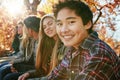 Teenager, group and portrait in park, boy and together on holiday, nature and relax by trees. Youth culture, happy Royalty Free Stock Photo