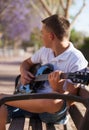 Teenager with a guitar