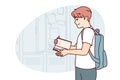 Teenager guy with book and backpack behind back stands near lockers in college room. Vector image